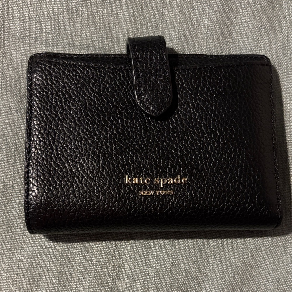 kate spade black pebbled leather snap wallet with gold logo